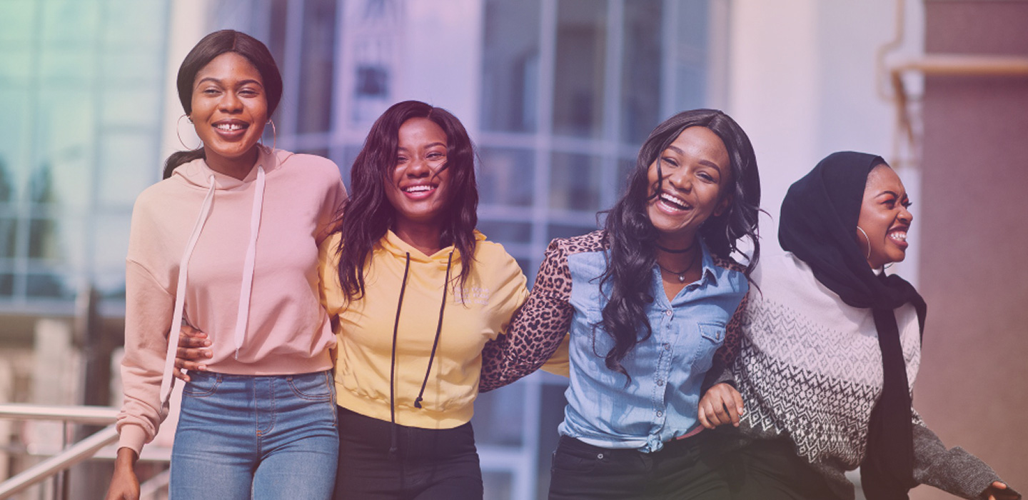 A group of young women celebrating together